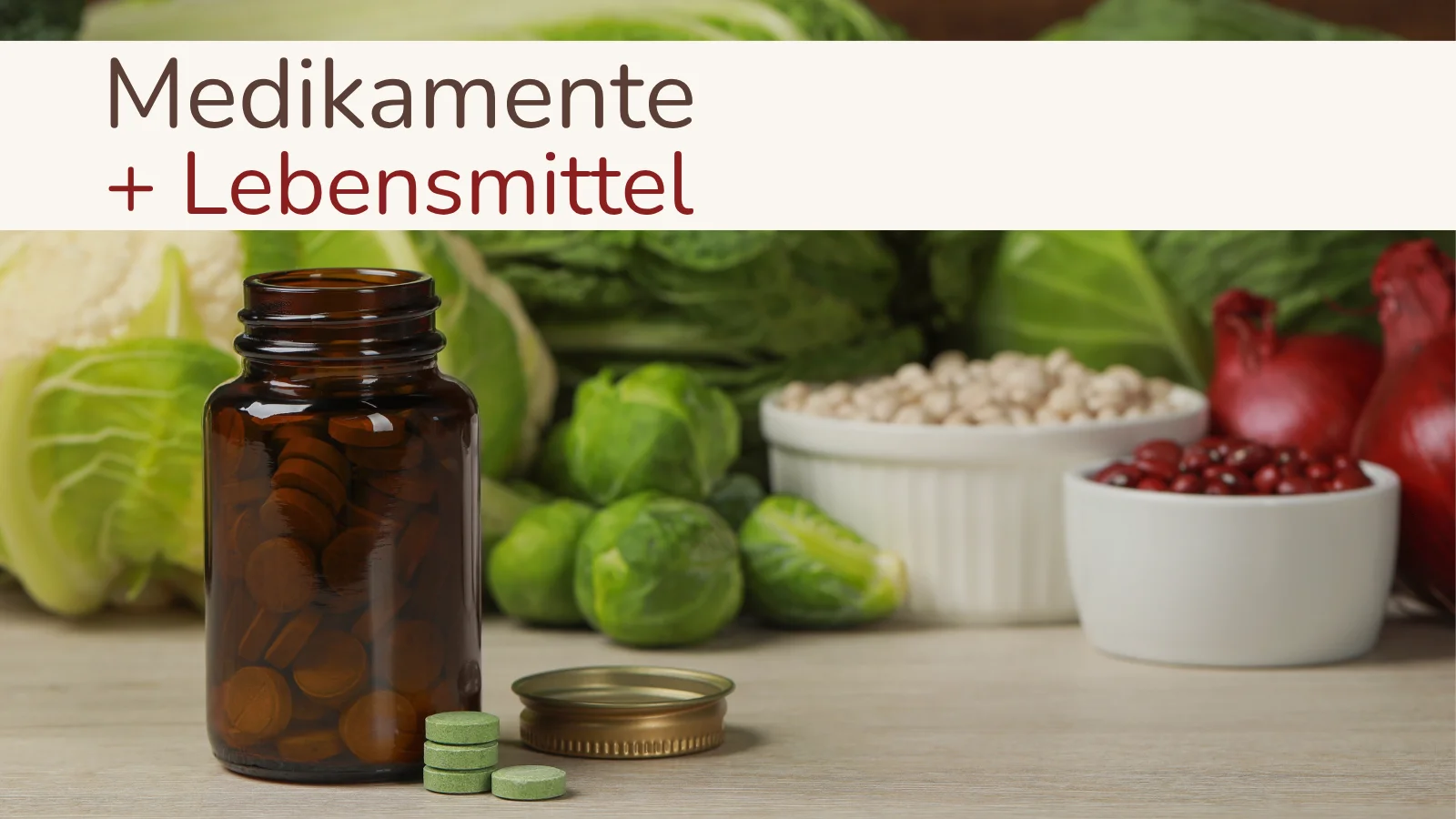 Tablettendose steht vor frischem Gemüse